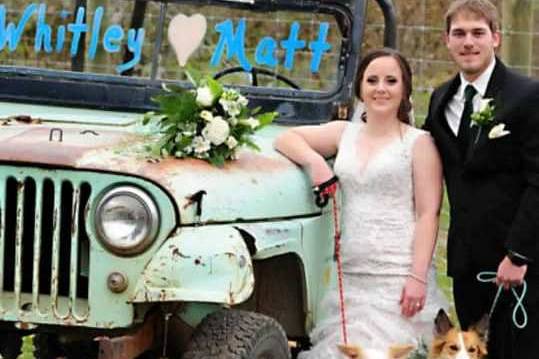 Newlyweds by the truck