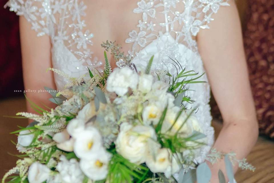 Holding a bouquet