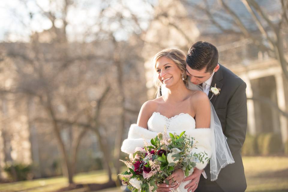 Hugging his bride