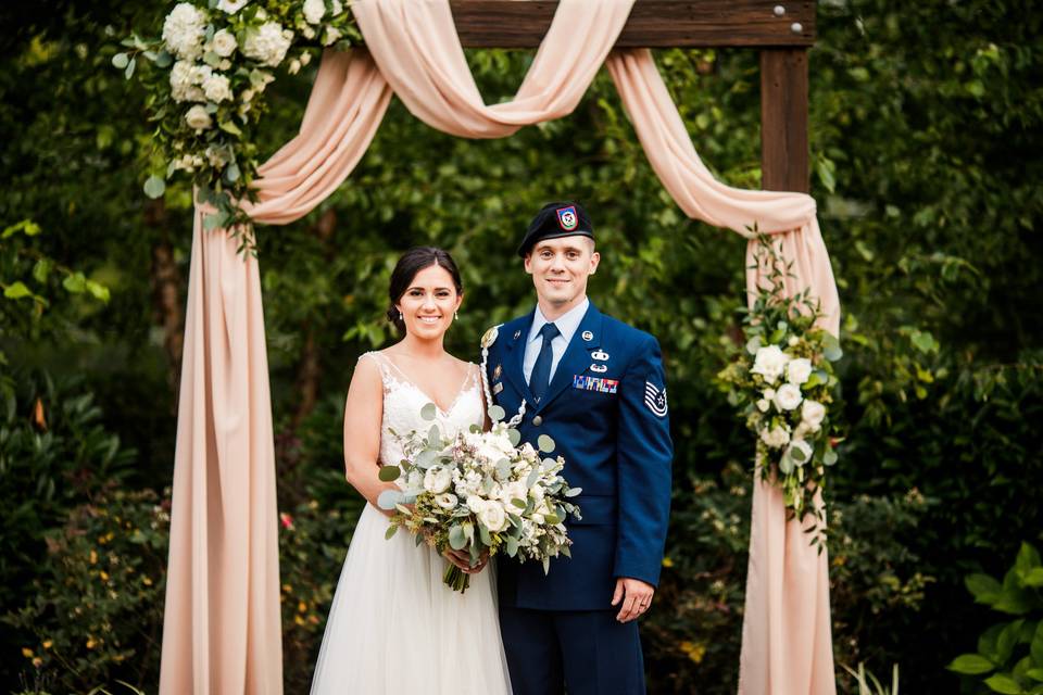 Newlyweds under the arch