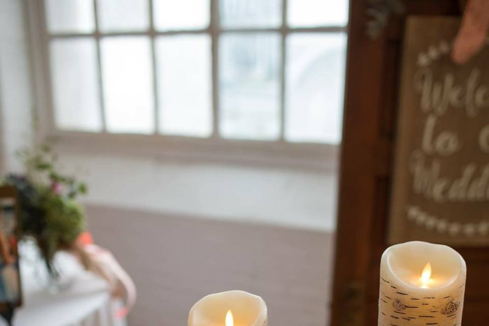 Table Decor for Autumn Wedding features our birch flickering flameless candles, our small lanterns, smokey taupe glass candlestick holders..fresh flowers and the popular mini white pumpkins.