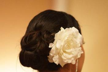 Updo with white flower