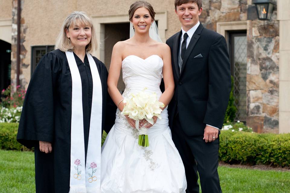 Newlyweds with reverend