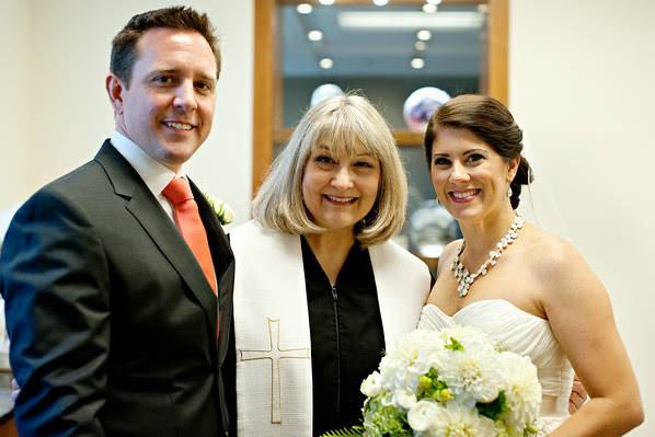 Newlyweds with reverend