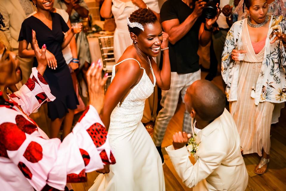 Bride and son dancing