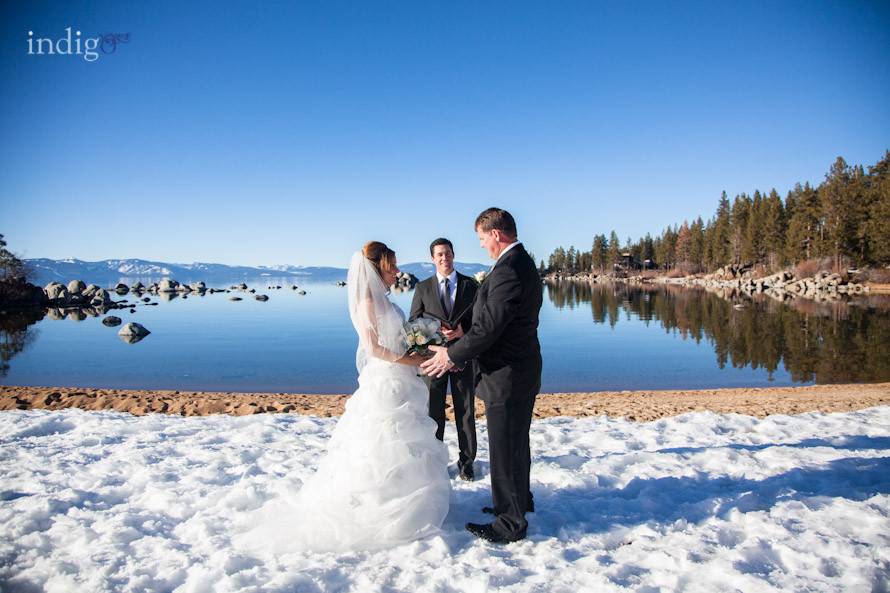 Newlyweds and officiant on the cable car