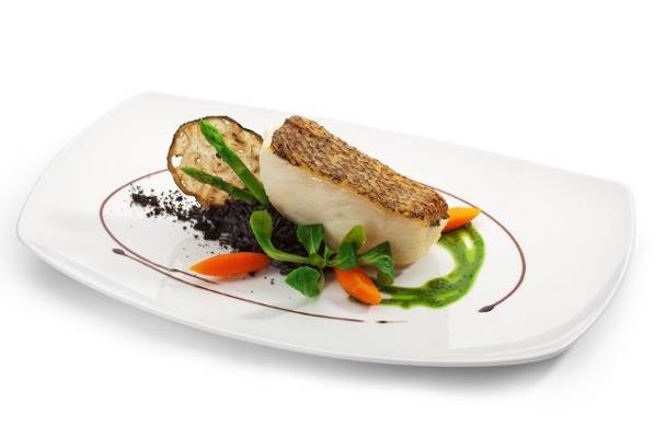 Seared and baked chilean sea bass, morel mushrooms, and black truffles, peas coulis, baby carrots confit.