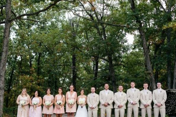 The couple with the bridesmaids and groomsmen