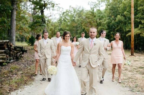 The couple with the bridesmaids and groomsmen