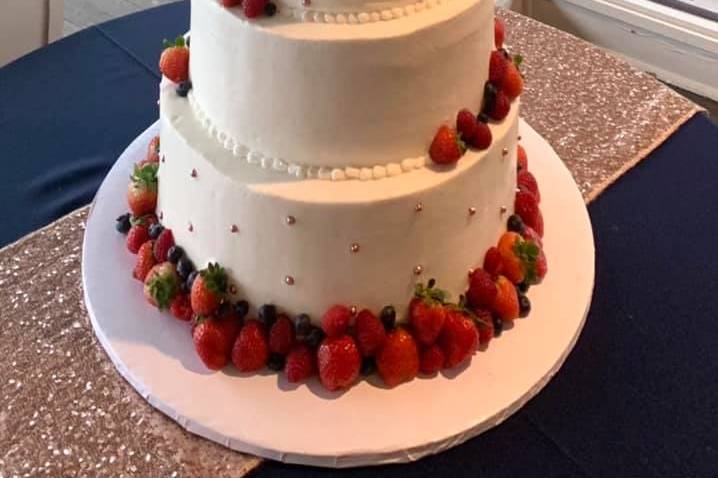 4 tier smooth cake with fruit