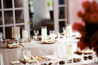 Reception Tables with hanging orchids and crystals