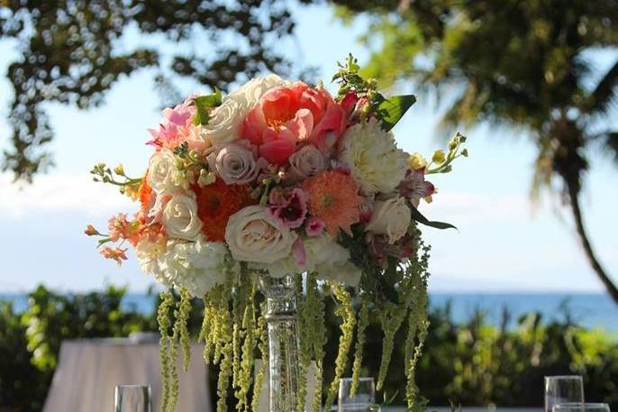 Reception Tables with hanging orchids and crystals