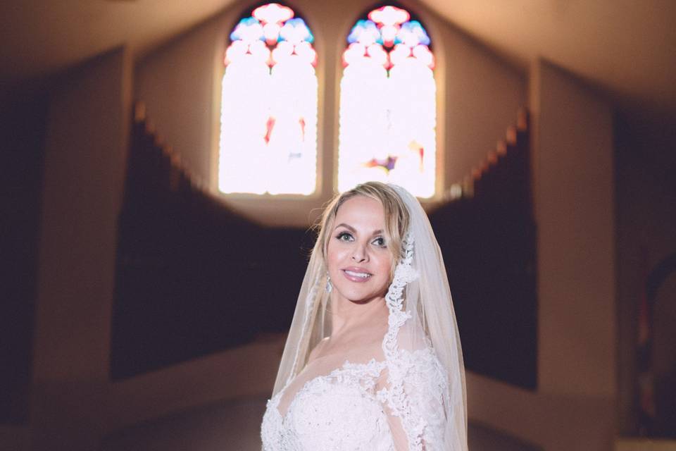 Bride posing in church