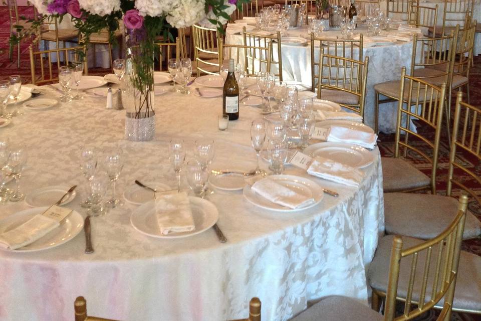 Table setup with white flower centerpiece