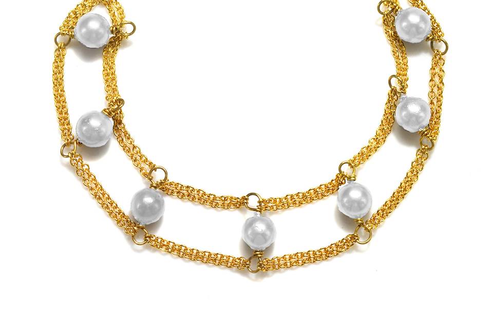 Amanda Rudey Pocohontas Bracelet ~ Freshwater pearls are placed between rows of delicate chain. Available in white or gray pearl or any color gemstone you would like! Available in 18k vermeil, Sterling Silver or 14k Gold. Adjustable 7-8 inches.