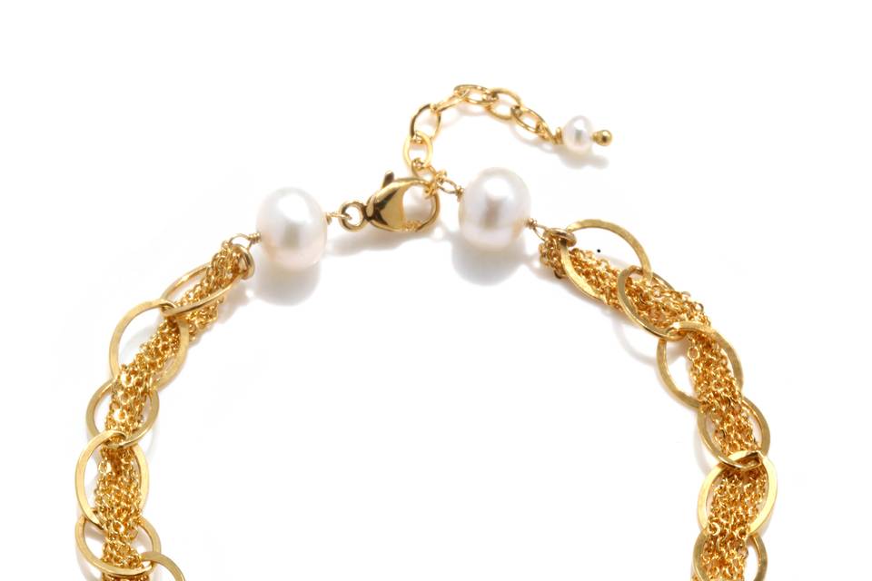 Amanda Rudey Goldmine Bracelet ~ Strands of delicate chain are woven through a thicker chain and capped off by freshwater pearls. Available in white or gray pearls or any color gemstone you would like! Available in 18k vermeil, Sterling Silver or 14k Gold. Adjustable 7-8 inches