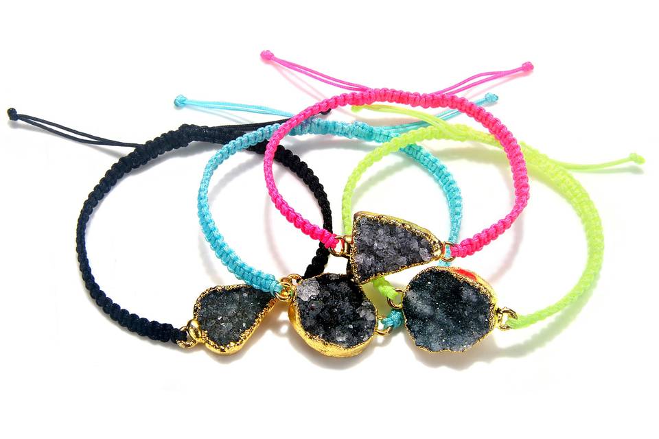 Druzy stone and choice of black, neon pink, turquoise or neon yellow silk cord. A grown-up friendship bracelet!
Adjustable 6.5 inches to 9 inches (to slide over hand)
Handmade with lots of love in the USA
Note: due to the natural quality of the druzy, please allow for slight variations in size, shape and shading.
Don't see the perfect color for you? Email us and we will find it for you!