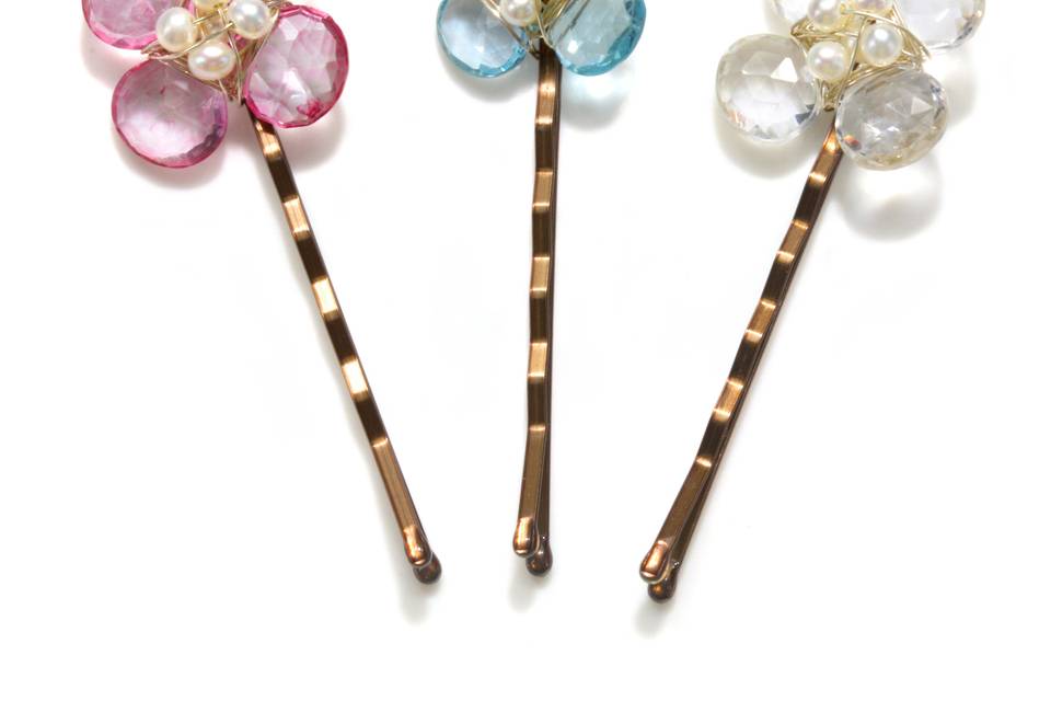 Amanda Rudey Flower Bobby Pin ~ Each bobby pin is topped off with a beautiful little gemstone flower with freshwater pearls. Available in white or gray pearl or any color gemstone you would like! Available in 18k vermeil, Sterling Silver or 14k Gold.
