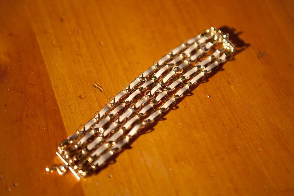 Closeup of Isabel's custom leather five layer bracelet