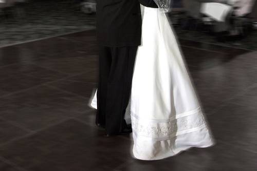 Bride and groom on the bridge at the Grand Plaza Resort