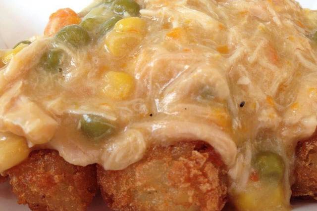 Chicken Tot Pie - Tots topped with homemade chicken pot pie filling.  Yes...we did that.