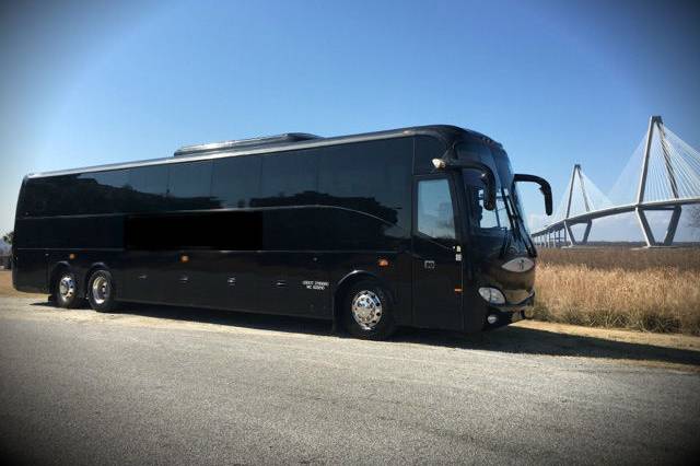 56 Passenger Motor Coach Bus with Black Leather Interior Seating