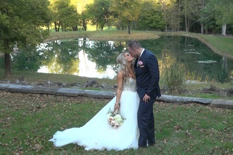 Couple by a rickety barn