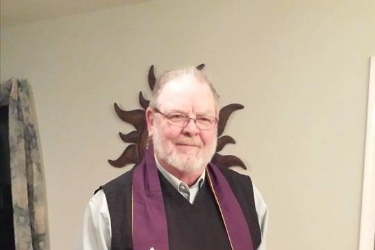 Rev. Davic C. Sassman at a home wedding