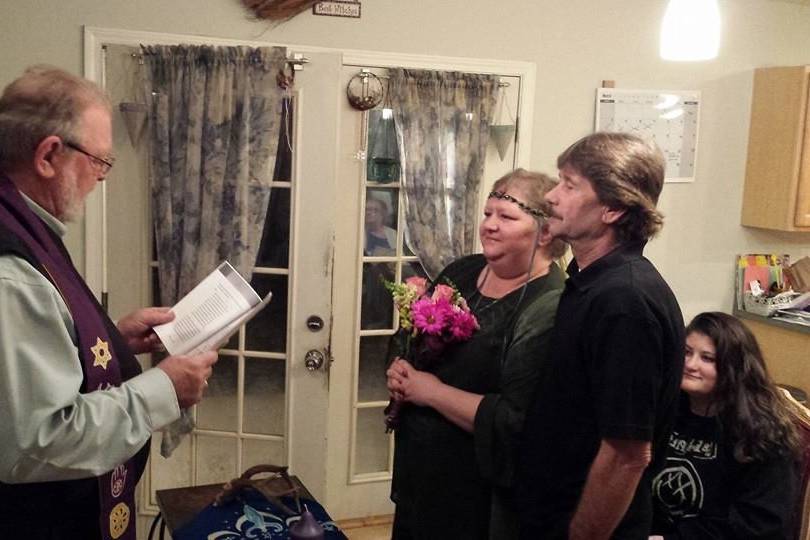 Rev. David C. Sassman performing a home wedding