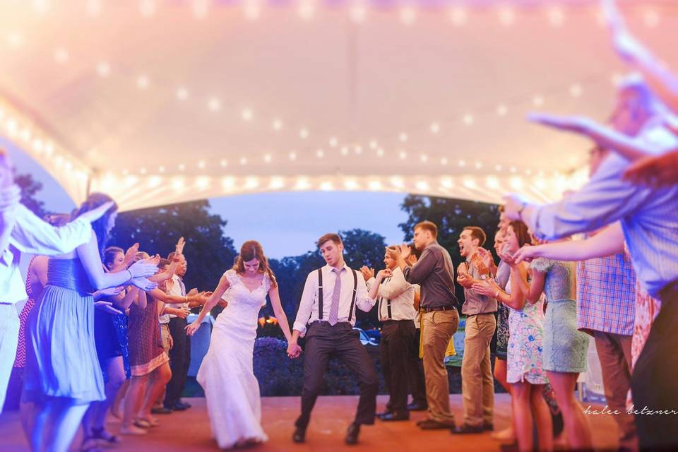 Couple and guests dancing