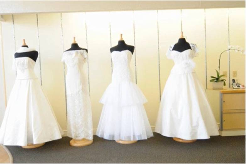 We not only design custom wedding gowns, but also provide you with our very own designer collection!