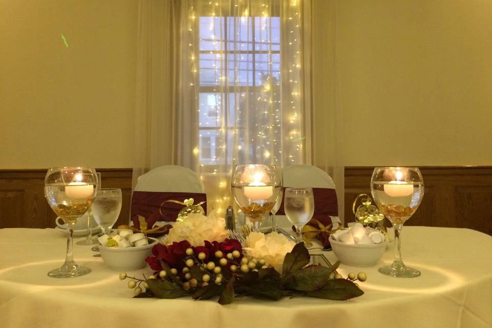 Table with elegant candle centerpiece