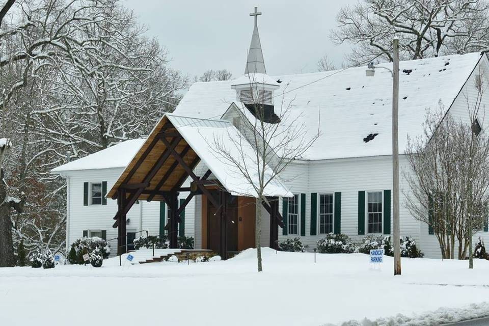 The church is beautiful in the snow.