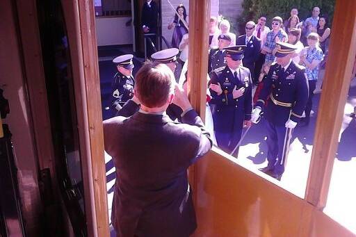 Soldiers honoring the newlyweds