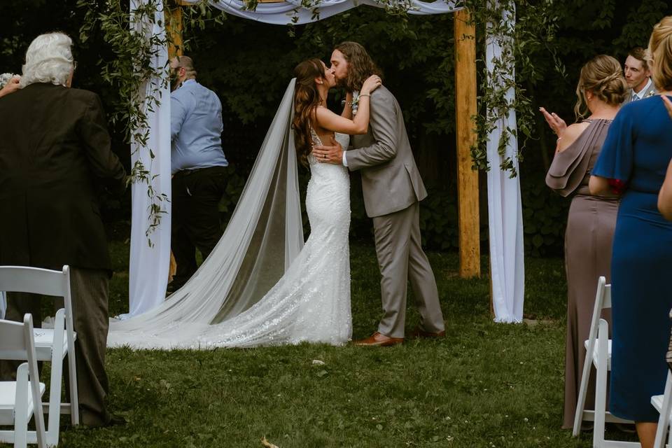 Couple under the arbor