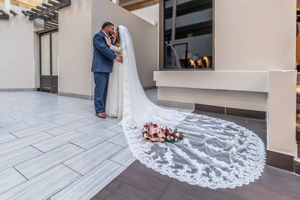 Bride and groom kiss