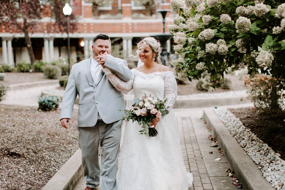 Newlyweds posing after their ceremony