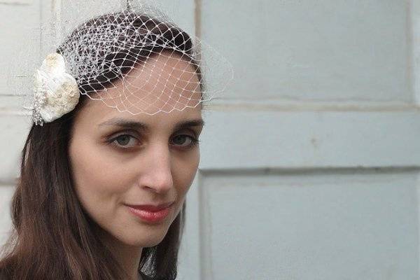 Embrace, wrapped silk bridal headpiece, rhinestones, lace with birdcage veil.