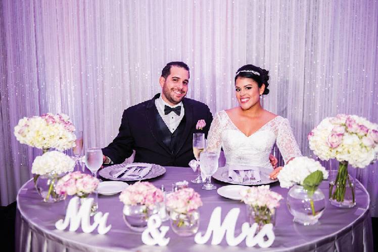 Newlyweds at the head table