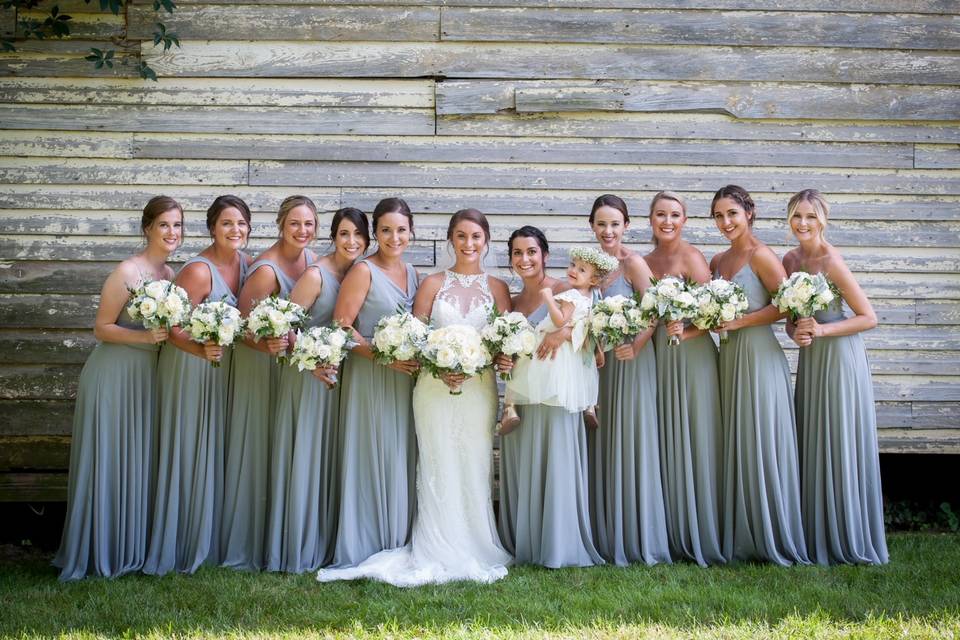 Bridesmaids by the barn