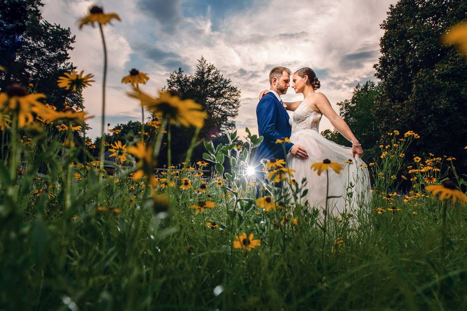 Bride and groom flower field
