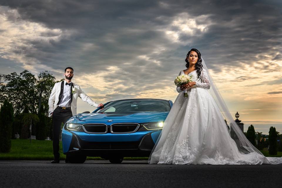 Bride and groom with BMW i8