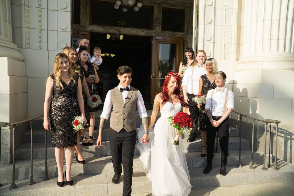 Newlyweds smiling during their departure