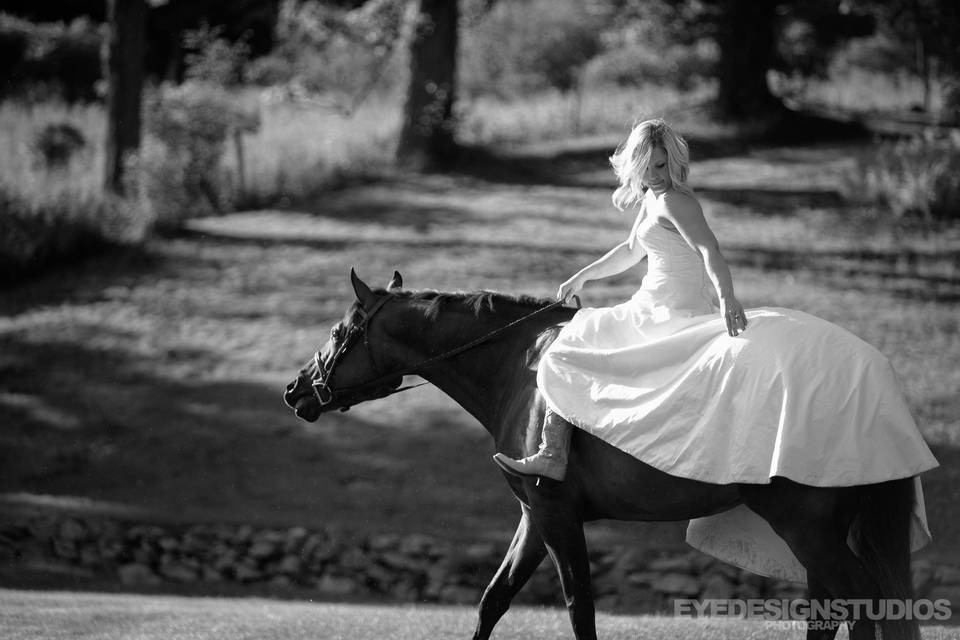 Riding a horse in wedding dress