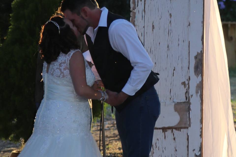 Newlyweds kissing