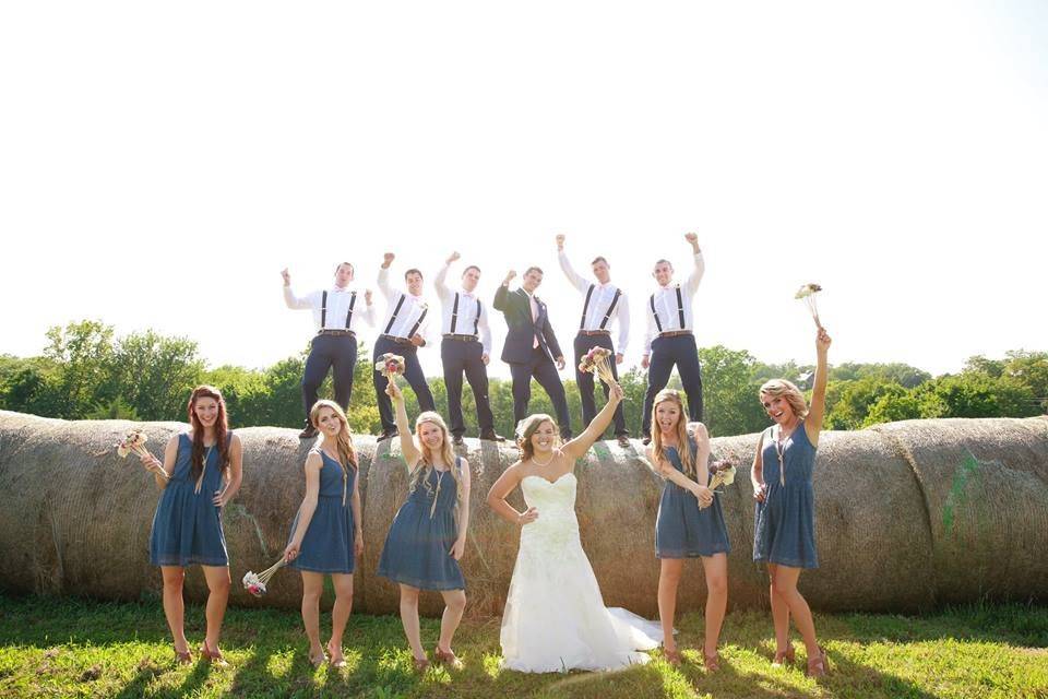 Bridesmaids and groomsmen with the bride and groom