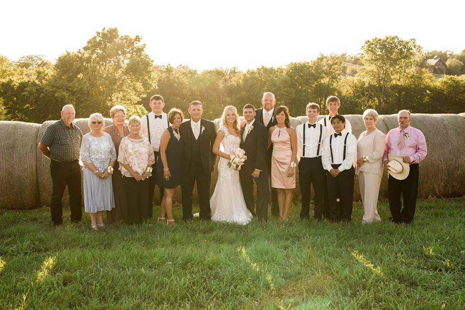 Bridesmaids and groomsmen with the bride and groom