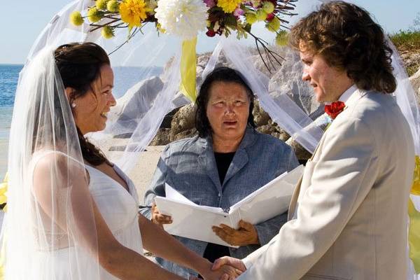 Noma performing a beach wedding at Fred Howard Park Beach.