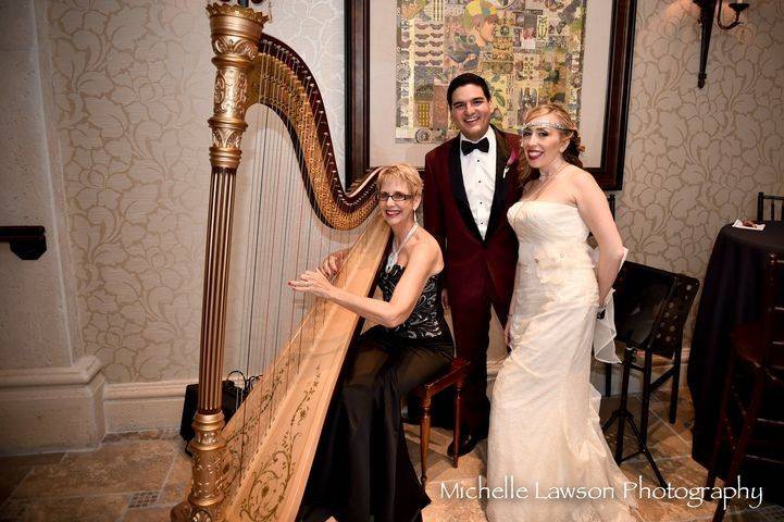 Newlyweds with the harpist