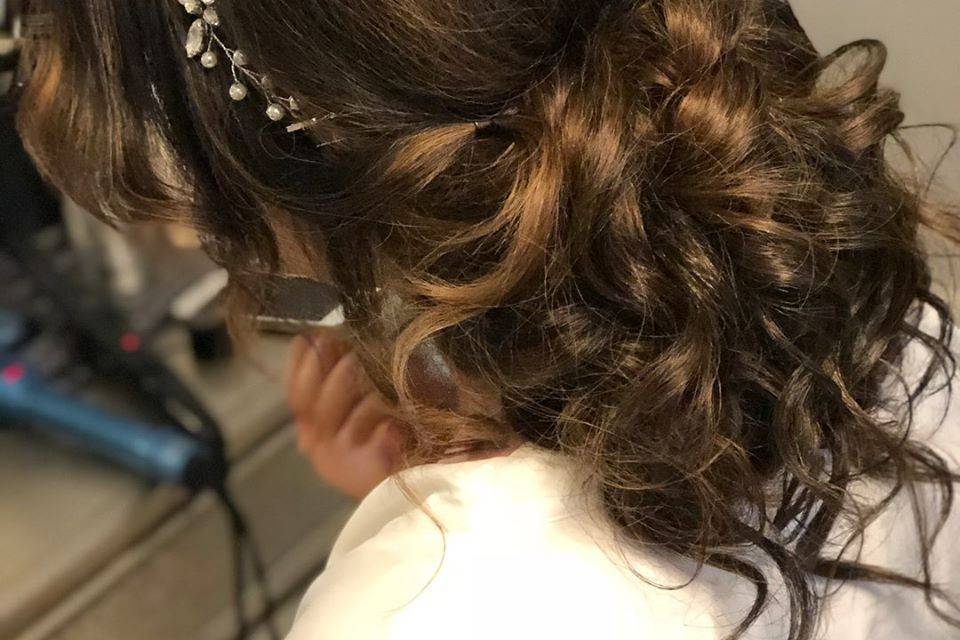 Updo with curls and headpiece